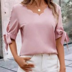 BLUSA RIBETE EN ABANICO DE MANGA CON ABERTURA