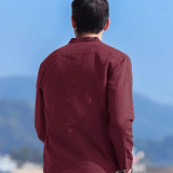 Camisa unicolor con botón