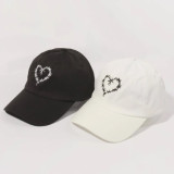 Gorra con bordado de corazón