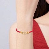 Pulsera con adorno de corazon entrelazado