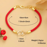 Pulsera con adorno de corazon entrelazado