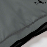 Camisa polo con estampado de pájaro