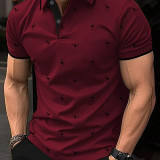 Camisa polo con estampado de pájaro